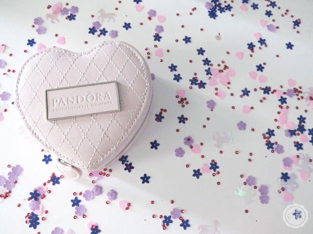 A small heart shaped Pandora jewelry box with beautiful stiched detailing on blush leather
